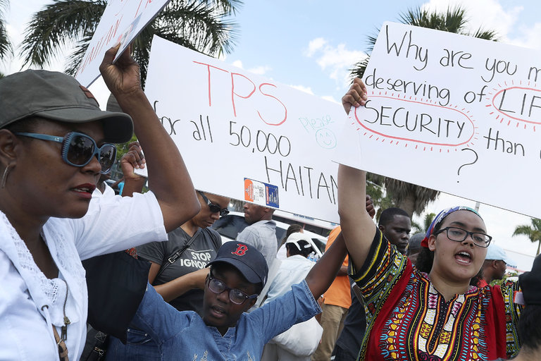 Protesters demonstrated in Miami in favor of the Temporary Protected Status program for Haitians. Credit Joe Raedle/Getty Images